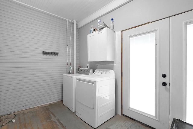 940 3rd St, Logan, OH 43138 - laundry room featuring cabinet space, separate washer and dryer, light wood-style floors, and plenty of natural light
