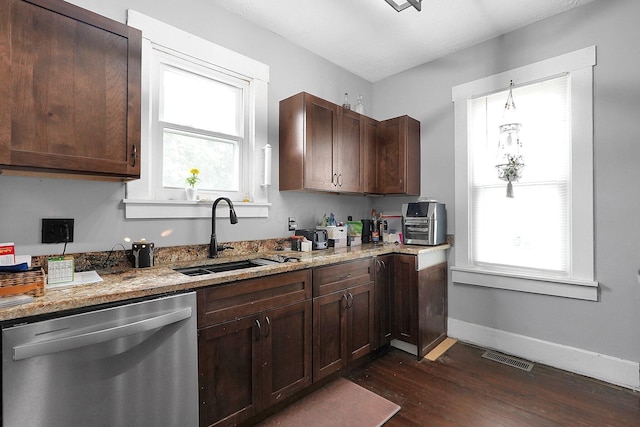 940 3rd St, Logan, OH 43138 - kitchen featuring stainless steel dishwasher, a sink, dark wood-style floors, baseboards, and healthy amount of natural light