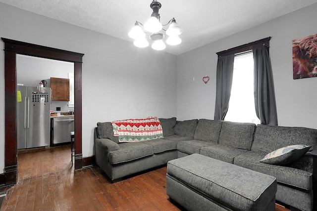 940 3rd St, Logan, OH 43138 - living area featuring a chandelier and dark wood finished floors