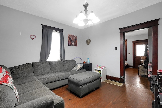940 3rd St, Logan, OH 43138 - living area featuring a chandelier, hardwood / wood-style floors, and baseboards