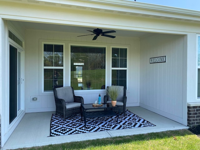 view of patio / terrace featuring a ceiling fan and covered porch