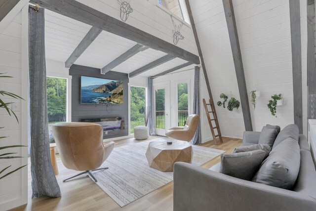 62579 Dunkle Creek Rd, Mcarthur, OH 45651 - living area with vaulted ceiling with beams, a fireplace, and wood finished floors