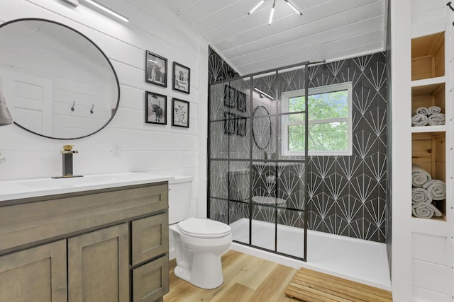 62579 Dunkle Creek Rd, Mcarthur, OH 45651 - bathroom with a walk in shower, vanity, toilet, and wood finished floors