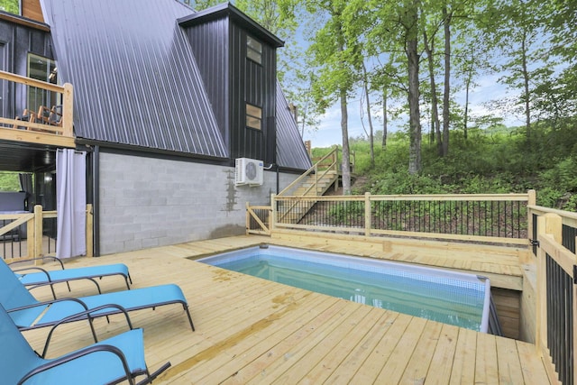 62579 Dunkle Creek Rd, Mcarthur, OH 45651 - view of swimming pool featuring stairs, ac unit, and a deck