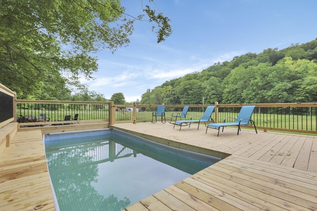 62579 Dunkle Creek Rd, Mcarthur, OH 45651 - view of swimming pool with a fenced in pool and a deck