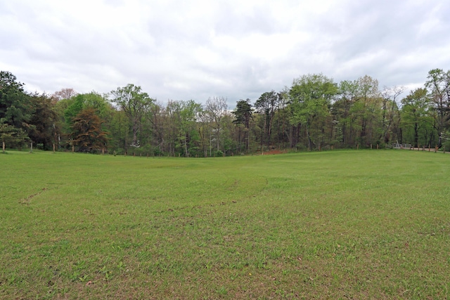 view of yard featuring a view of trees