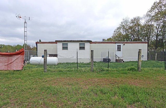 view of outbuilding with fence