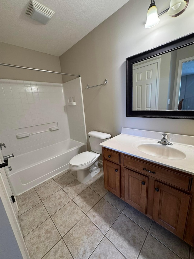 bathroom featuring visible vents, tile patterned flooring, vanity, tub / shower combination, and toilet