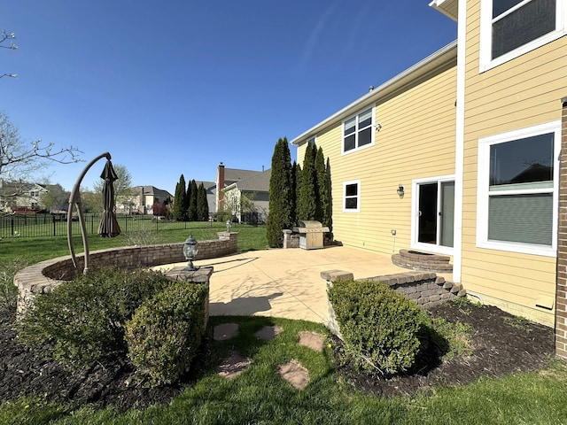 view of yard with a patio and fence