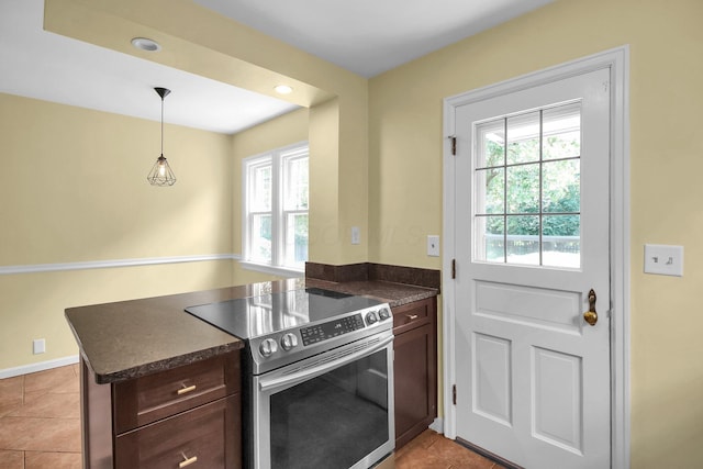 461 E N Broadway St, Columbus, OH 43214 - kitchen with electric stove, dark countertops, healthy amount of natural light, a peninsula, and recessed lighting