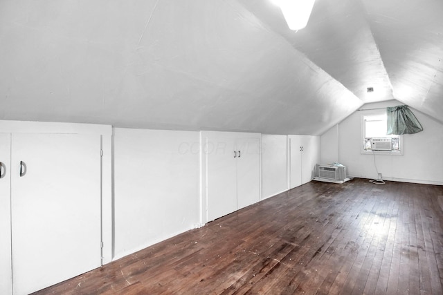 461 E N Broadway St, Columbus, OH 43214 - bonus room with dark wood-type flooring, lofted ceiling, cooling unit, and an AC wall unit