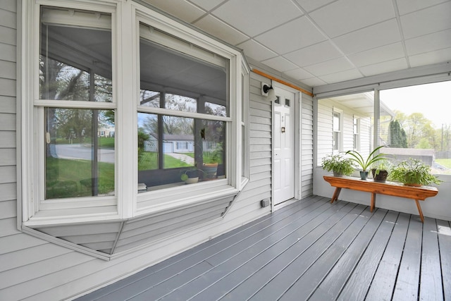 sunroom / solarium featuring plenty of natural light