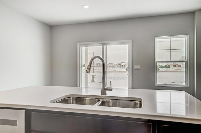 interior space featuring a sink and light countertops