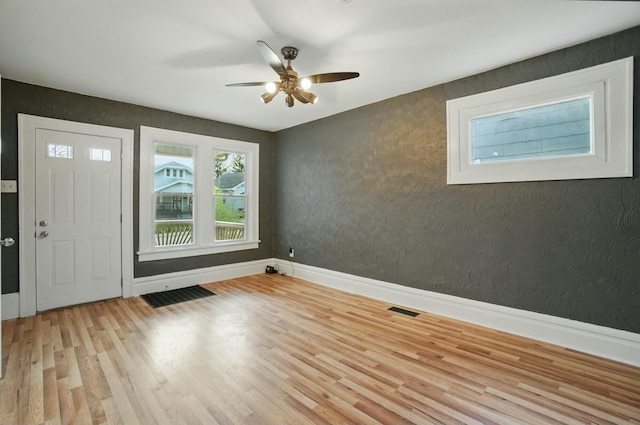 219 Belvidere Ave, Columbus, OH 43223 - entrance foyer with ceiling fan, baseboards, visible vents, and light wood-style flooring