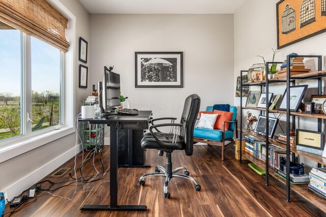 office featuring wood finished floors and baseboards