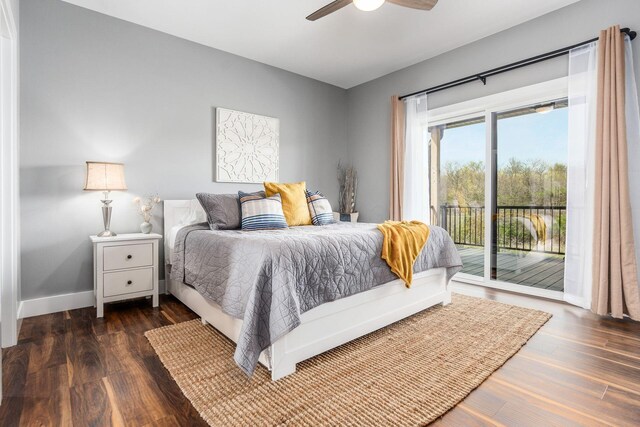 bedroom featuring baseboards, a ceiling fan, wood finished floors, and access to exterior