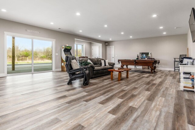 living room with baseboards, wood finished floors, pool table, and recessed lighting