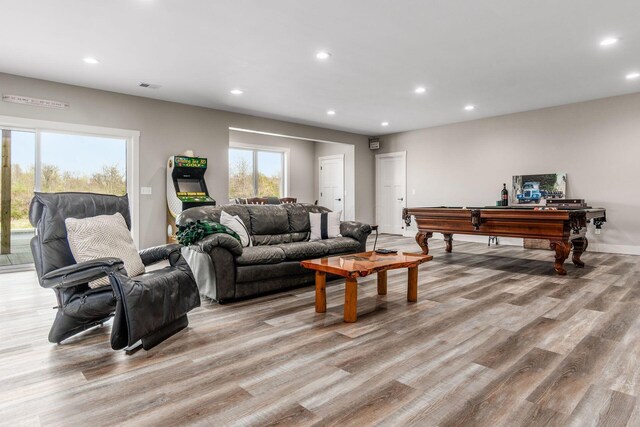 living area featuring light wood-style flooring, visible vents, pool table, and recessed lighting
