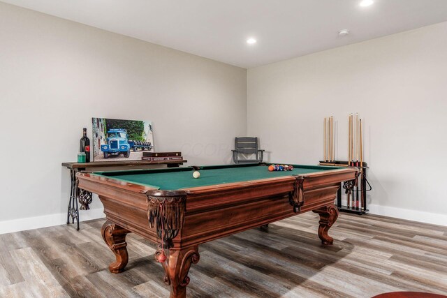 recreation room with wood finished floors, pool table, and baseboards