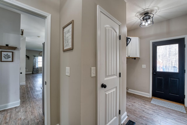 779 Millstone Ln, Mount Vernon, OH 43050 - foyer entrance with baseboards and light wood-style floors