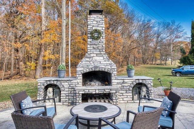 779 Millstone Ln, Mount Vernon, OH 43050 - view of patio / terrace featuring an outdoor stone fireplace