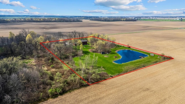 bird's eye view featuring a water view and a rural view
