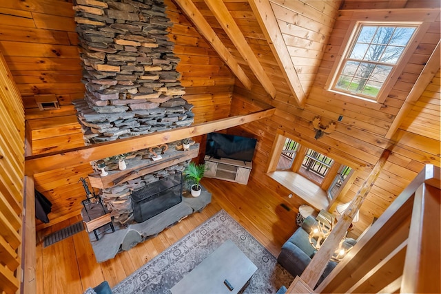 living room featuring wooden ceiling, wood walls, lofted ceiling, and hardwood / wood-style floors