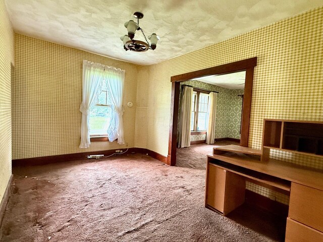 15825 State Route 207, Mount Sterling, OH 43143 - unfurnished office with healthy amount of natural light, wallpapered walls, a chandelier, carpet floors, and a textured ceiling