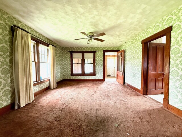 15825 State Route 207, Mount Sterling, OH 43143 - carpeted spare room with wallpapered walls, ceiling fan, and a textured ceiling