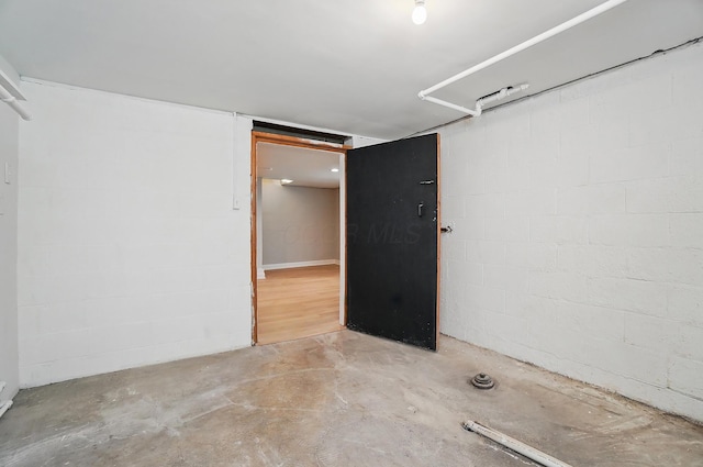 finished below grade area with concrete block wall