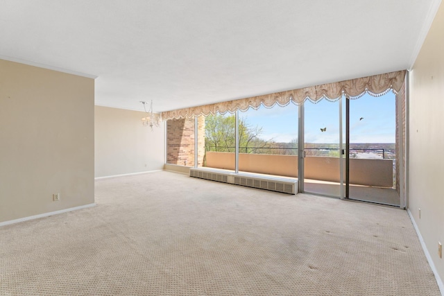 1000 Urlin Ave Unit 520, Columbus, OH 43212 - carpeted spare room featuring radiator and a chandelier