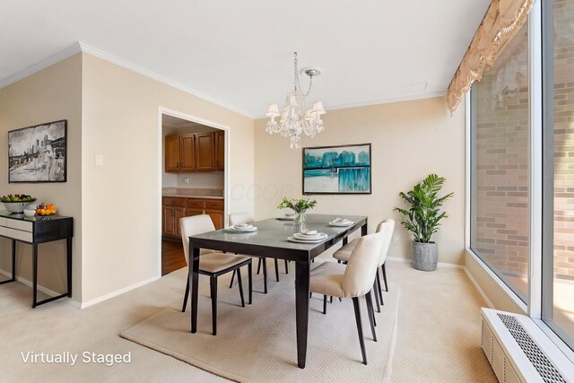 1000 Urlin Ave Unit 520, Columbus, OH 43212 - dining area with crown molding, light carpet, and a chandelier