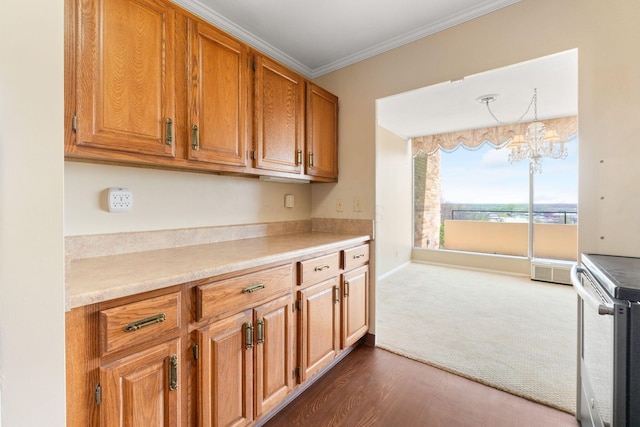 1000 Urlin Ave Unit 520, Columbus, OH 43212 - kitchen with electric stove, crown molding, light countertops, brown cabinets, and dark wood-type flooring