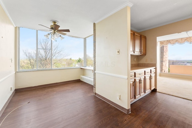 1000 Urlin Ave Unit 520, Columbus, OH 43212 - interior space with a ceiling fan, crown molding, healthy amount of natural light, and dark wood finished floors