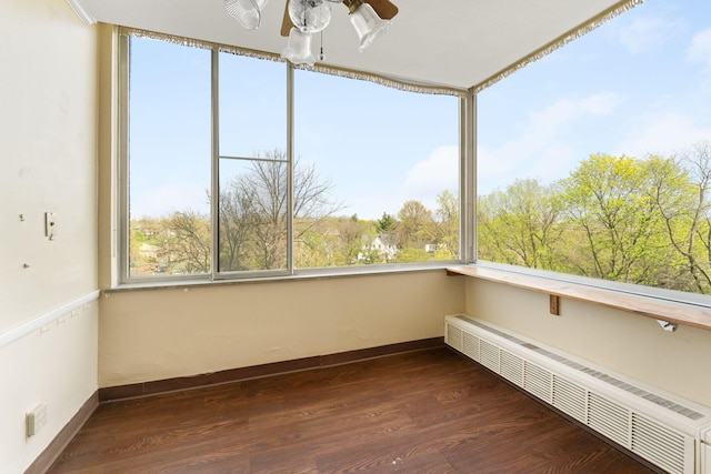 1000 Urlin Ave Unit 520, Columbus, OH 43212 - unfurnished sunroom with a baseboard heating unit