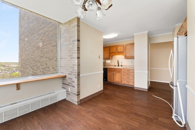 1000 Urlin Ave Unit 520, Columbus, OH 43212 - kitchen with freestanding refrigerator, ornamental molding, radiator heating unit, a ceiling fan, and dark wood-type flooring