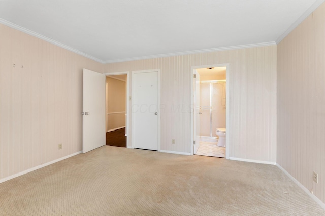 1000 Urlin Ave Unit 520, Columbus, OH 43212 - unfurnished bedroom featuring carpet floors, ornamental molding, and ensuite bathroom