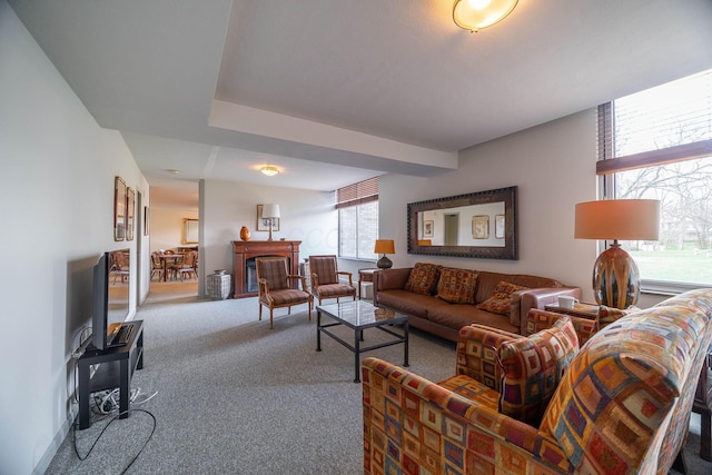 1000 Urlin Ave Unit 520, Columbus, OH 43212 - living area with carpet floors and a glass covered fireplace