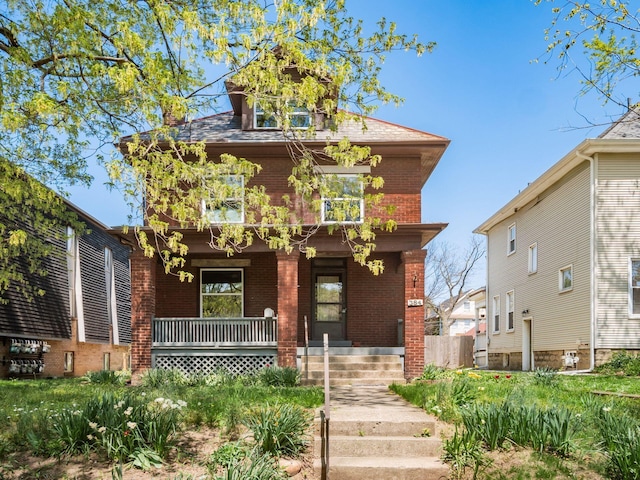 384 E 13th Ave, Columbus, OH 43201 - traditional style home featuring brick siding and covered porch