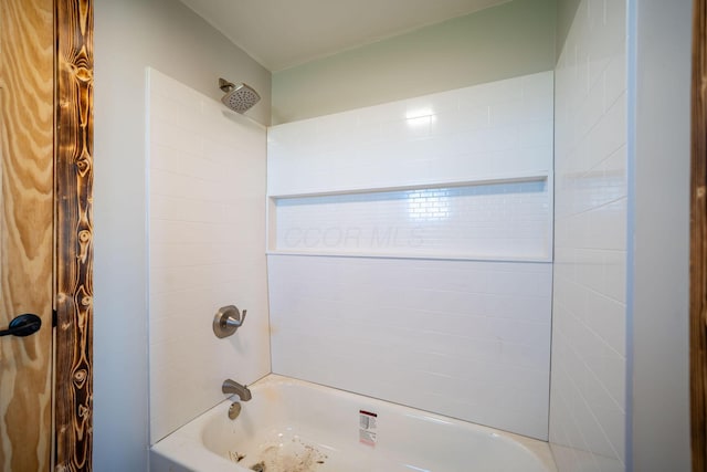 bathroom with shower / bath combination
