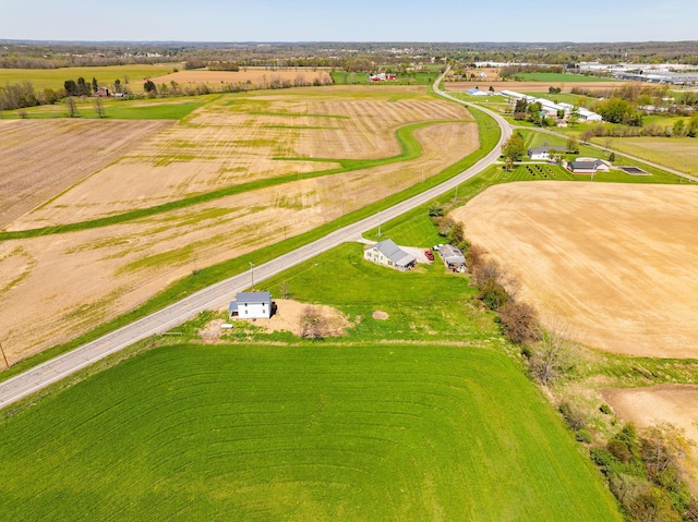 birds eye view of property featuring a rural view