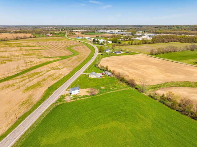 birds eye view of property featuring a rural view
