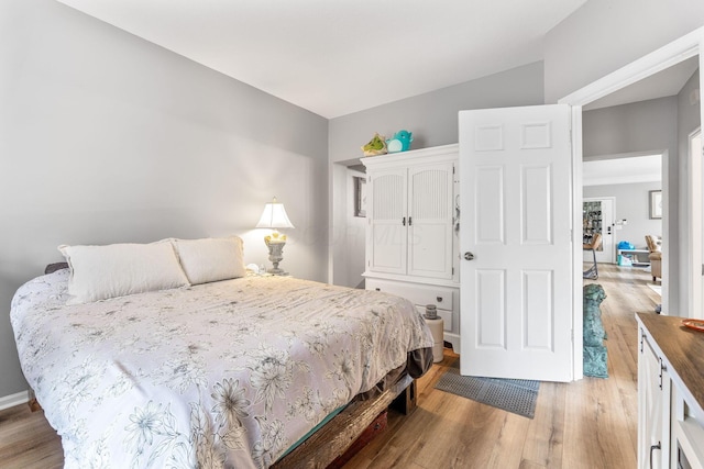 bedroom with light wood-type flooring