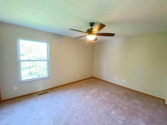 829 Crevis Ln, Columbus, OH 43228 - empty room featuring ceiling fan and light colored carpet