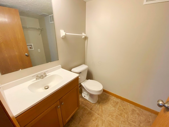 829 Crevis Ln, Columbus, OH 43228 - bathroom featuring vanity and a textured ceiling