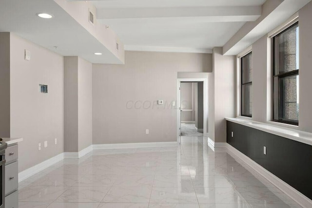 50 W Broad St Unit 2104, Columbus, OH 43215 - spare room with recessed lighting, visible vents, marble finish floor, and baseboards