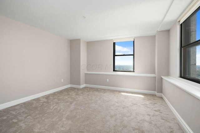 50 W Broad St Unit 2104, Columbus, OH 43215 - spare room with carpet flooring and baseboards