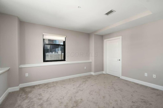 50 W Broad St Unit 2104, Columbus, OH 43215 - unfurnished room with baseboards, visible vents, and carpet floors