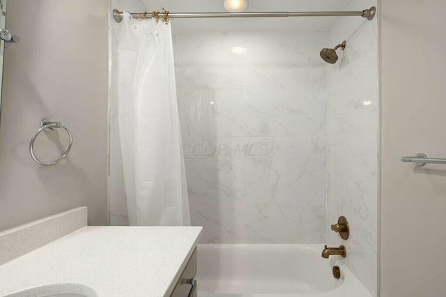 50 W Broad St Unit 2104, Columbus, OH 43215 - bathroom with vanity and shower / bath combo with shower curtain