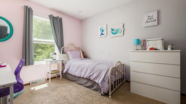 650 Licking View Dr, Heath, OH 43056 - carpeted bedroom with multiple windows and baseboards